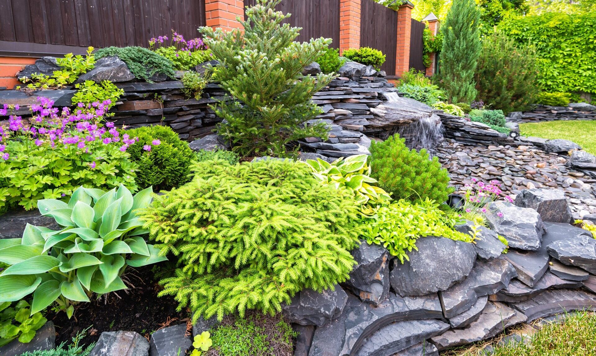 Stonework and planted features that showcase hardscaping work.