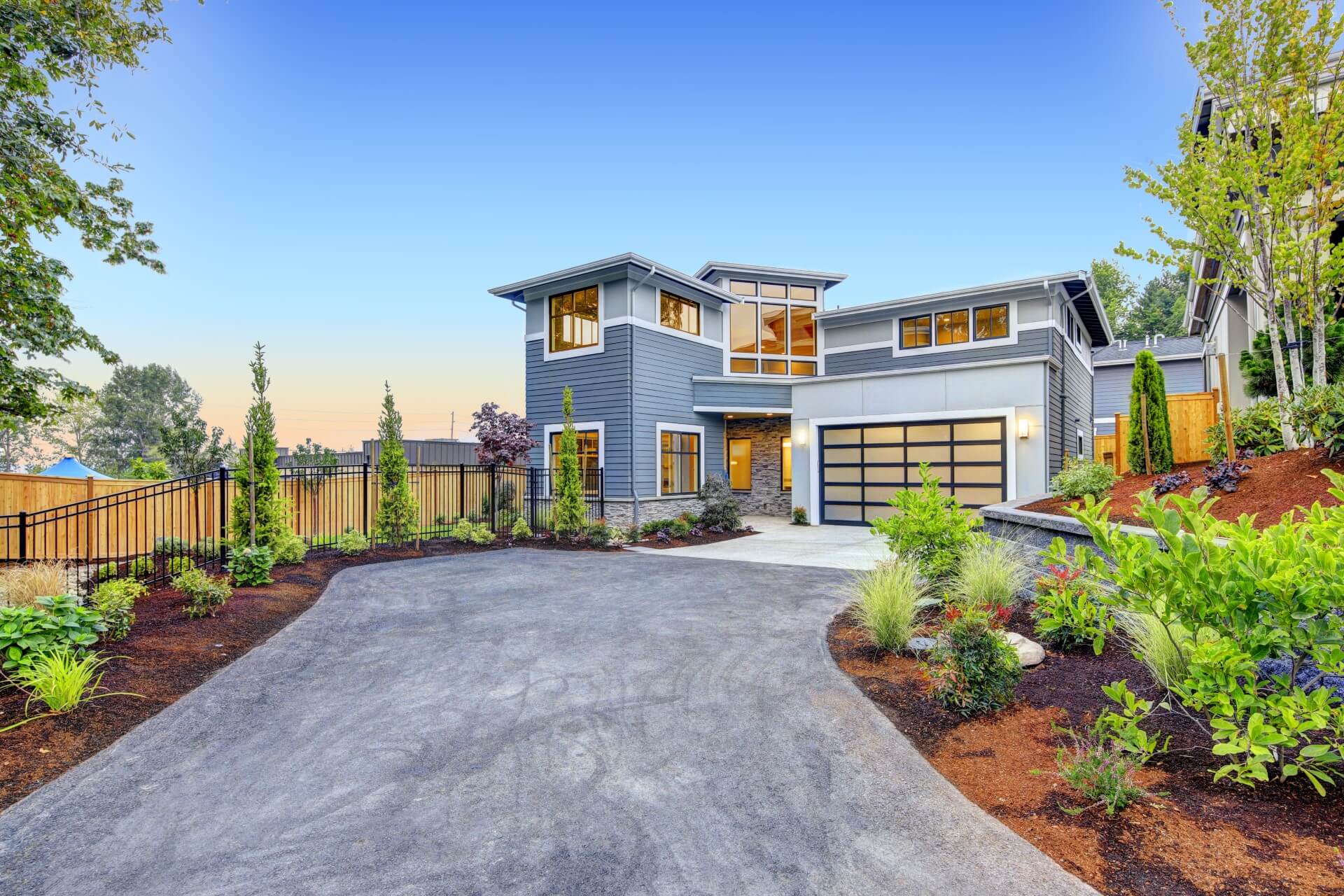 Landscaped front yard with strong curb appeal and planting work.